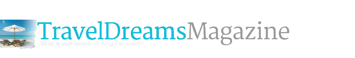 Logo of Travel Dreams Magazine with beach chairs and an umbrella illustration on the left, evoking a sense of travel adventure. The tagline "What is your version of living the dream?" invites readers to explore their tourism dreams, perhaps starting in Tennessee.